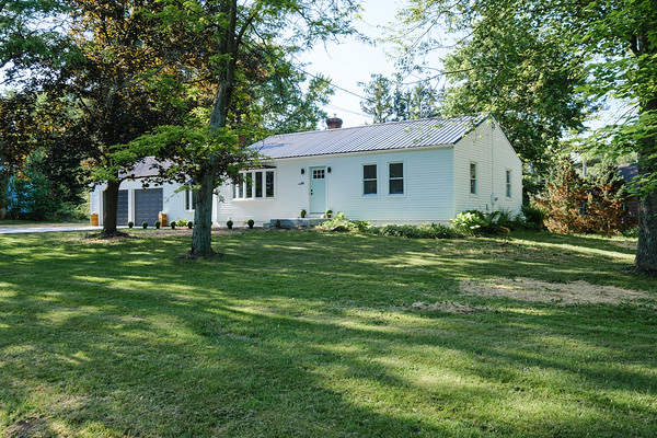 Exterior rehab white ranch home